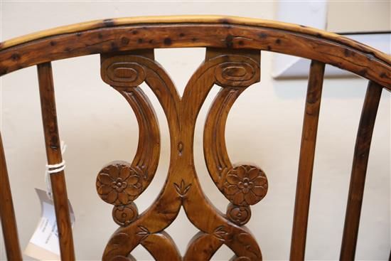 An early 19th century yew, ash and elm Windsor chair, W.2ft D.1ft 9in. H.3ft 5in.